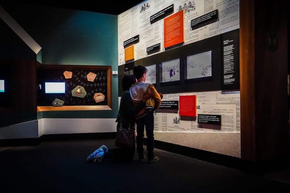 Some stories of the Stolen Generation are displayed on a big white wall